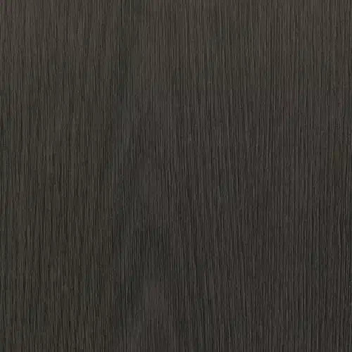 Grå overflade med synlig træmønster, der efterligner træets æstetik.