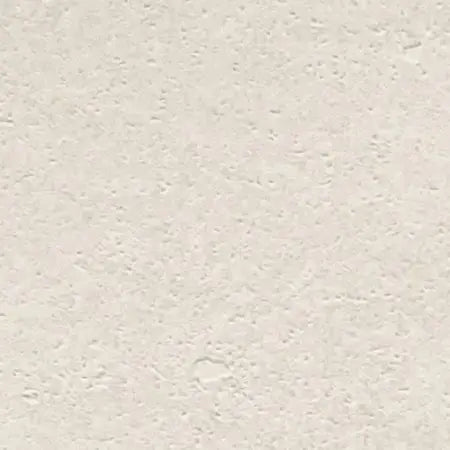 Tekstureret overflade i off-white cementfarve med naturlige variationer og mat finish.