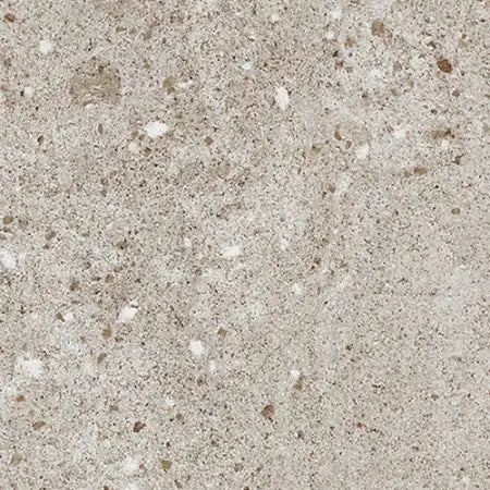Nærbillede af terrazzo-lignende overflade med beige, hvide og brune pletter, som ligner natursten.