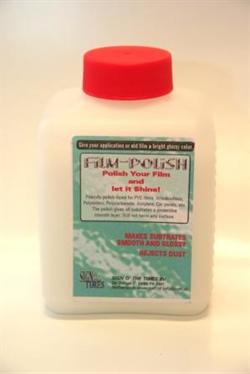 Hvid plastbeholder med rød hætte. Etiket siger "Film Polish" og beskriver produktets anvendelse.