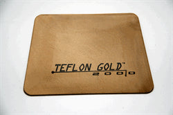 Rektangulær, gylden skraber med teksten "Teflon Gold 2000" i sort.