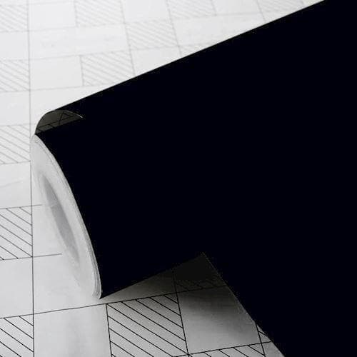 Sort mat folie på rulle, let udrullet for at vise glat overflade.